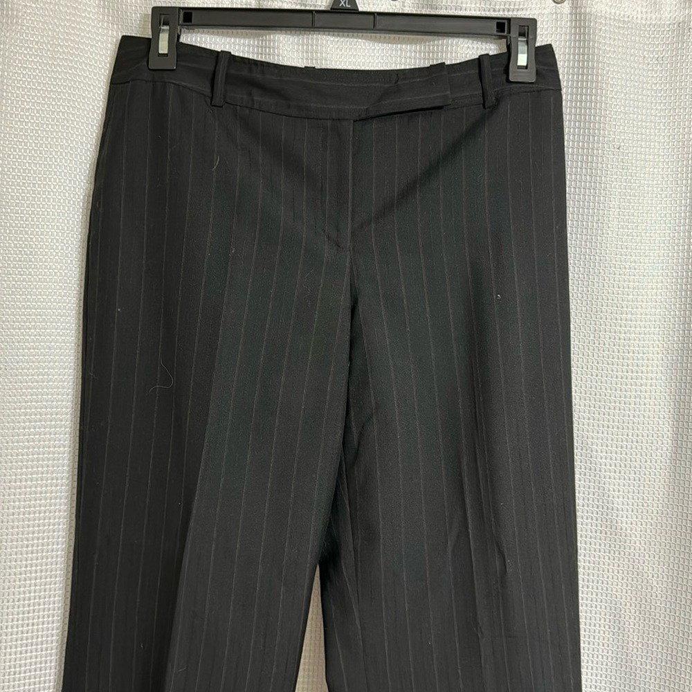Ann Taylor black signature fit just below waist fit pants.